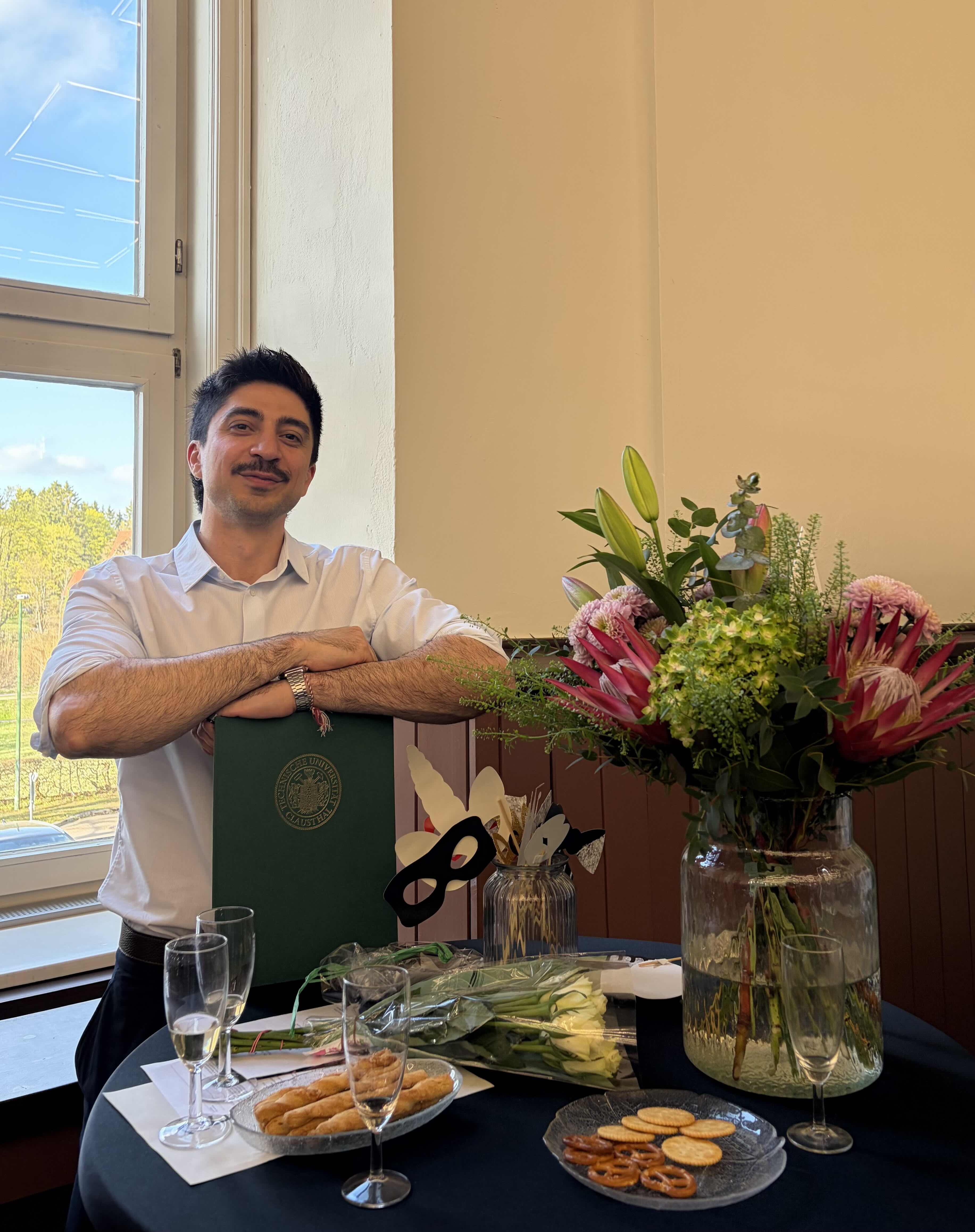 PhD defense photo with coworkers and supervisors